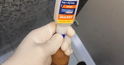 In a Doctor's Office I Apply Hot Glue to My Dick